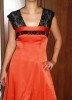 NICOLETTA, abito arancio in satin e pizzo